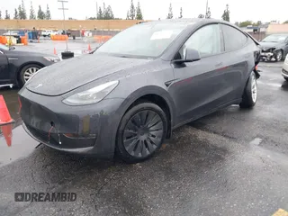 2024 Tesla Model Y Long Range with VIN 7SAYGDEE5RA241433, listed as a IAAI auction lot 41569277 with 7,490 mi miles. Bid and sale history available at carsss.com. Image 19.