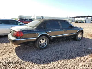 2001 Lincoln Continental with VIN 1LNHM97V61Y604213, listed as a Copart auction lot 52517535 with 112,391 mi miles and Salvage Title. Bid and sale history available at DreamBid. Image 3.
