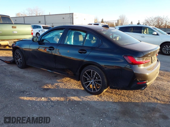 2022 BMW 3 Series 330i xDrive with VIN 3MW5R7J03N8C37885, listed as a IAAI auction lot 41018959 with 13,491 mi miles. Bid and sale history available at carsss.com. Image 3.