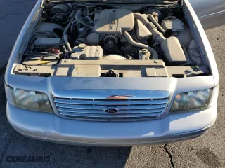 2005 Ford Crown Victoria LX with VIN 2FAFP74W75X165930, listed as a Copart auction lot 81641294 with 138,521 mi miles and Clean Title. Bid and sale history available at carsss.com. Image 11.