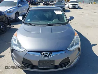 2013 Hyundai Veloster w/Black Int with VIN KMHTC6AD5DU095867, listed as a IAAI auction lot 42698380 with 115,528 mi miles and . Bid and sale history available at DreamBid. Image 6.