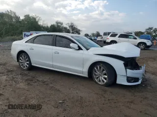 2017 Audi A8 L with VIN WAU44AFDXHN006499, listed as a Copart auction lot 74043014 with 73,043 mi miles and Salvage Title. Bid and sale history available at carsss.com. Image 4.