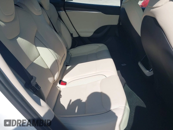 2022 Tesla Model S Plaid with VIN 5YJSA1E64NF484904, listed as a IAAI auction lot 41594464 with 25,299 mi miles and . Bid and sale history available at DreamBid. Image 8.