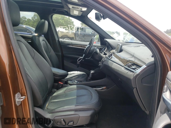 2016 BMW X1 xDrive28i with VIN WBXHT3C31GP880132, listed as a Copart auction lot 69129132 with 74,759 mi miles. Bid and sale history available at carsss.com. Image 5.