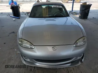 2004 Mazda MX-5 Miata LS z VIN JM1NB353X40404238, wystawiony jako Copart lot #61601895 z przebiegiem 110 549 mil mil oraz Szkoda całkowita • Salvage title. Historia ofert i sprzedaży dostępna na DreamBid. Obrazek 5.