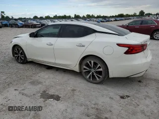 2018 Nissan Maxima Platinum z VIN 1N4AA6AP6JC404541, wystawiony jako Copart lot #58216865 z przebiegiem 85 673 mil mil oraz Szkoda całkowita • Salvage title. Historia ofert i sprzedaży dostępna na DreamBid. Obrazek 2.