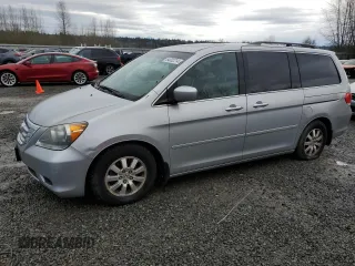 2010 Honda Odyssey EX-L with VIN 5FNRL3H74AB101370, listed as a Copart auction lot 84302214 with 182,217 mi miles and Clean Title. Bid and sale history available at carsss.com. Image 1.