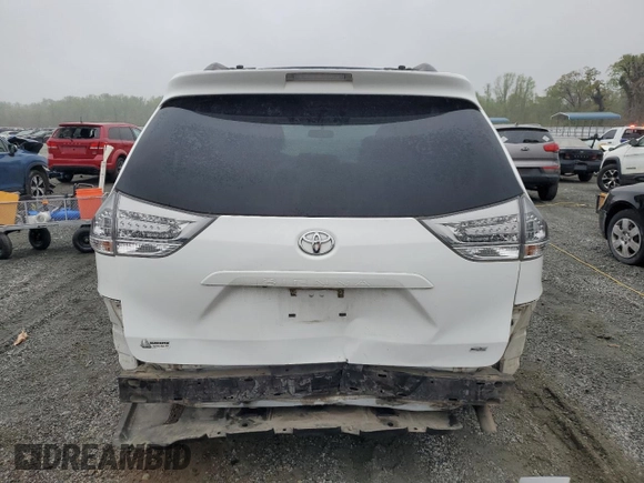 2015 Toyota Sienna SE with VIN 5TDXK3DCXFS670630, listed as a Copart auction lot 51305415 with 142,892 mi miles and Salvage Title. Bid and sale history available at carsss.com. Image 6.