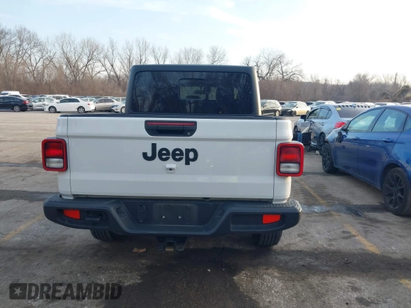 2023 Jeep Gladiator Sport S z VIN 1C6HJTAG7PL535209, wystawiony jako IAAI lot #41483780 z przebiegiem 39 376 mil mil oraz . Historia ofert i sprzedaży dostępna na DreamBid. Obrazek 16.