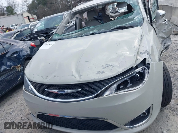 2017 Chrysler Pacifica Limited with VIN 2C4RC1GG9HR560544, listed as a IAAI auction lot 41807810 with 137,768 mi miles and . Bid and sale history available at DreamBid. Image 12.