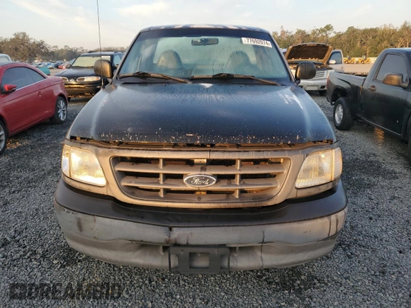 2003 Ford F-150 XL with VIN 1FTRF17W13NA97772, listed as a Copart auction lot 77692074 with Not Provided miles and Salvage Title. Bid and sale history available at DreamBid. Image 5.