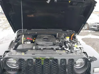 2022 Jeep Wrangler 4xe Unlimited Sahara with VIN 1C4JJXP66NW101035, listed as a IAAI auction lot 41528135 with 17,943 mi miles. Bid and sale history available at carsss.com. Image 10.