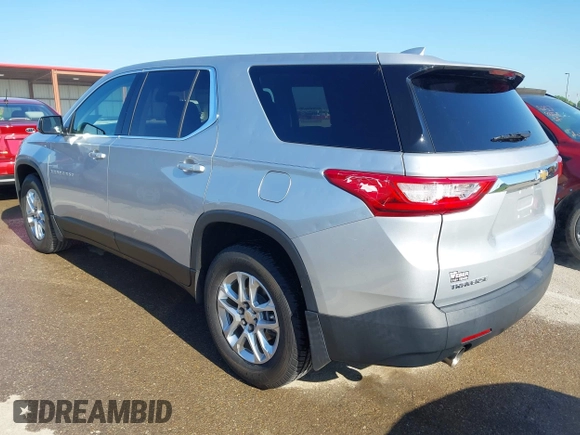 2018 Chevrolet Traverse LS z VIN 1GNERFKW7JJ145166, wystawiony jako IAAI lot #42161304 z przebiegiem 104 165 mil mil oraz . Historia ofert i sprzedaży dostępna na DreamBid. Obrazek 3.