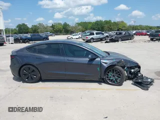 2024 Tesla Model 3 z VIN 5YJ3E1EAXRF864719, wystawiony jako IAAI lot #42129944 z przebiegiem 3 776 mil mil oraz . Historia ofert i sprzedaży dostępna na DreamBid. Obrazek 13.