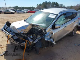 2015 Ford Escape Titanium with VIN 1FMCU0JX2FUB70760, listed as a IAAI auction lot 41649089 with 1 mi miles. Bid and sale history available at carsss.com. Image 2.