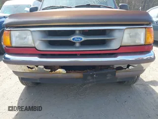 1997 Ford Ranger XLT with VIN 1FTCR15XXVTA14735, listed as a IAAI auction lot 42113672 with 114,939 mi miles. Bid and sale history available at carsss.com. Image 6.