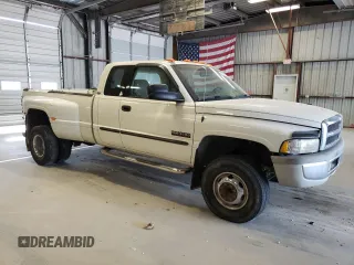 2002 Dodge Ram 3500 with VIN 3B7MF33C02M204269, listed as a Copart auction lot 68442394 with 238,041 mi miles and Salvage Title. Bid and sale history available at carsss.com. Image 4.