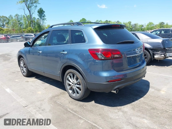 2015 Mazda CX-9 Grand Touring with VIN JM3TB3DV4F0448210, listed as a IAAI auction lot 42061711 with 149,289 mi miles. Bid and sale history available at carsss.com. Image 3.