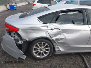2017 Ford Fusion SE z VIN 3FA6P0HD2HR149699, wystawiony jako IAAI lot #41872383 z przebiegiem 95 587 mil mil oraz . Historia ofert i sprzedaży dostępna na DreamBid. Obrazek 6.