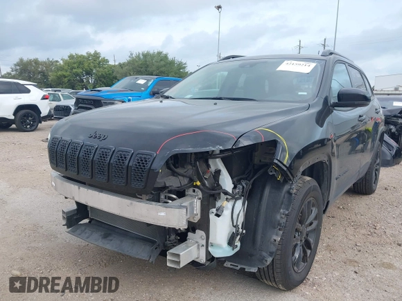 2023 Jeep Cherokee Altitude Lux with VIN 1C4PJMMB9PD114936, listed as a IAAI auction lot 42159214 with 59,525 mi miles. Bid and sale history available at carsss.com. Image 6.