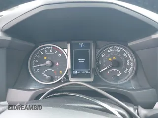 2022 Toyota Tacoma SR with VIN 3TMCZ5AN2NM507478, listed as a IAAI auction lot 42425907 with 40,796 mi miles and . Bid and sale history available at DreamBid. Image 7.