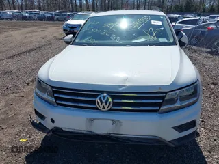 2018 Volkswagen Tiguan S z VIN 3VV1B7AX5JM043090, wystawiony jako IAAI lot #41998165 z przebiegiem Nie podano mil oraz . Historia ofert i sprzedaży dostępna na DreamBid. Obrazek 11.