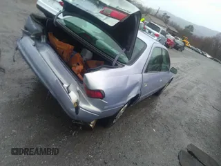 1997 Toyota Camry LE z VIN 4T1BG22K8VU108750, wystawiony jako IAAI lot #41706625 z przebiegiem 296 386 mil mil oraz . Historia ofert i sprzedaży dostępna na DreamBid. Obrazek 4.