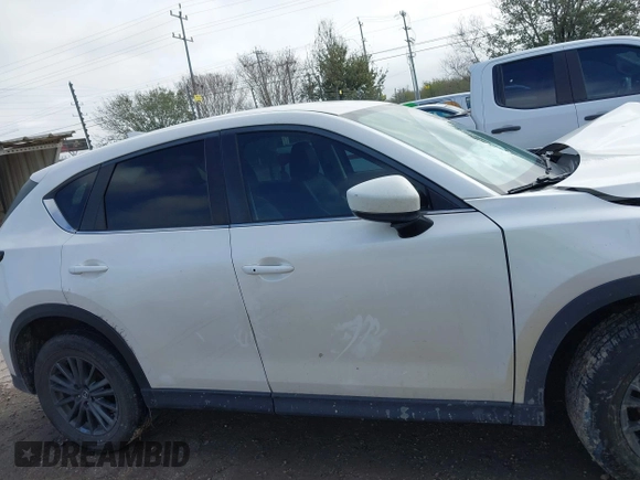 2020 Mazda CX-5 Touring with VIN JM3KFACM9L0771919, listed as a IAAI auction lot 41527773 with 93,417 mi miles and . Bid and sale history available at DreamBid. Image 14.