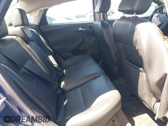 2018 Ford Focus Titanium with VIN 1FADP3J21JL323767, listed as a IAAI auction lot 42375218 with 104,440 mi miles and . Bid and sale history available at DreamBid. Image 8.