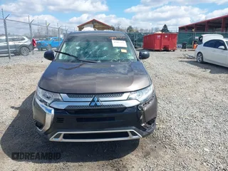 2020 Mitsubishi Outlander ES z VIN JA4AZ3A33LZ015378, wystawiony jako IAAI lot #41887351 z przebiegiem 113 349 mil mil oraz . Historia ofert i sprzedaży dostępna na DreamBid. Obrazek 13.