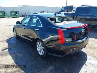 2014 Cadillac ATS Standard RWD with VIN 1G6AA5RX3E0101977, listed as a IAAI auction lot 40459124 with 125,360 mi miles. Bid and sale history available at carsss.com. Image 3.