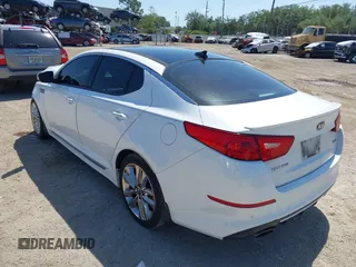 2015 Kia Optima SXL Turbo with VIN 5XXGR4A63FG517492, listed as a IAAI auction lot 42022042 with 162,400 mi miles and . Bid and sale history available at DreamBid. Image 3.