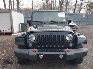 2015 Jeep Wrangler Unlimited Sahara with VIN 1C4HJWEG0FL661723, listed as a IAAI auction lot 41998393 with 89,077 mi miles. Bid and sale history available at carsss.com. Image 12.