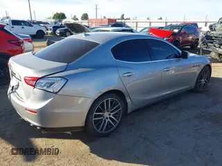 2015 Maserati Ghibli z VIN ZAM57XSA7F1135961, wystawiony jako IAAI lot #40831583 z przebiegiem 89 671 mil mil oraz . Historia ofert i sprzedaży dostępna na DreamBid. Obrazek 4.