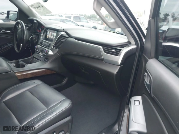 2019 Chevrolet Suburban LT with VIN 1GNSCHKC2KR175748, listed as a IAAI auction lot 41596699 with 93,204 mi miles. Bid and sale history available at carsss.com. Image 5.