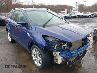 2014 Ford Escape Titanium with VIN 1FMCU9J99EUA46103, listed as a IAAI auction lot 42018097 with 169,878 mi miles and . Bid and sale history available at DreamBid. Image 6.