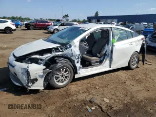 2019 Toyota Prius L Eco z VIN JTDKARFU8K3101261, wystawiony jako Copart lot #60470675 z przebiegiem 24 917 mil mil oraz Szkoda całkowita • Salvage title. Historia ofert i sprzedaży dostępna na DreamBid. Obrazek 1.