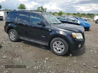 2008 Mercury Mariner Premier z VIN 4M2CU97128KJ17304, wystawiony jako Copart lot #55965555 z przebiegiem 134 473 mil mil oraz Szkoda całkowita • Salvage title. Historia ofert i sprzedaży dostępna na DreamBid. Obrazek 4.