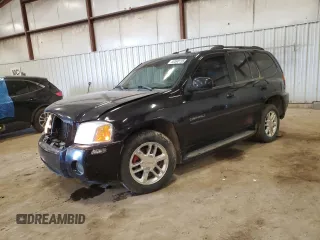 2006 GMC Envoy Denali with VIN 1GKET63M162221610, listed as a Copart auction lot 50590155 with 184,117 mi miles and Clean Title. Bid and sale history available at carsss.com. Image 1.