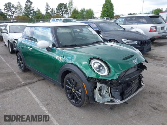2021 MINI Hardtop Cooper SE with VIN WMWXP3C06M2N26986, listed as a IAAI auction lot 42023528 with 39,068 mi miles and . Bid and sale history available at DreamBid. Image 1.