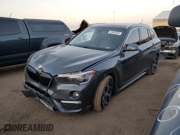 2018 BMW X1 xDrive28i with VIN WBXHT3C38J3H33310, listed as a Copart auction lot 73492324 with 88,620 mi miles and Salvage Title. Bid and sale history available at carsss.com. Image 1.