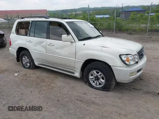 2000 Lexus LX 470 z VIN JT6HT00W6Y0105658, wystawiony jako IAAI lot #42282606 z przebiegiem 199 580 mil mil oraz . Historia ofert i sprzedaży dostępna na DreamBid. Obrazek 1.