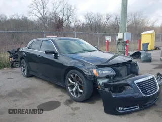 2013 Chrysler 300 with VIN 2C3CCABG2DH599204, listed as a IAAI auction lot 41544228 with 153,832 mi miles. Bid and sale history available at carsss.com. Image 1.