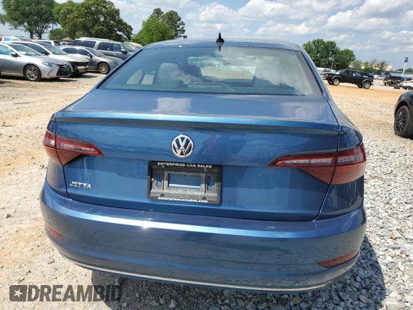 2021 Volkswagen Jetta S z VIN 3VWC57BUXMM001907, wystawiony jako Copart lot #54909405 z przebiegiem 130 101 mil mil oraz Szkoda całkowita • Salvage title. Historia ofert i sprzedaży dostępna na DreamBid. Obrazek 6.