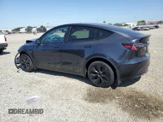 2025 Tesla Model Y Long Range z VIN 7SAYGDED0SF317270, wystawiony jako Copart lot #52387395 z przebiegiem 1 350 mil mil oraz Szkoda całkowita • Salvage title. Historia ofert i sprzedaży dostępna na DreamBid. Obrazek 2.