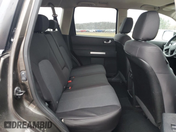 2011 Mitsubishi Endeavor LS with VIN 4A4JN2AS6BE032693, listed as a Copart auction lot 86910564 with 130,097 mi miles and Salvage Title. Bid and sale history available at carsss.com. Image 11.