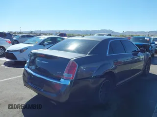 2014 Chrysler 300 with VIN 2C3CCAAG1EH191375, listed as a IAAI auction lot 41867688 with 218,740 mi miles. Bid and sale history available at carsss.com. Image 4.