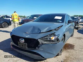 2023 Mazda 3 S Carbon Edition with VIN JM1BPBLM8P1611106, listed as a IAAI auction lot 42191902 with 37,244 mi miles and . Bid and sale history available at DreamBid. Image 2.