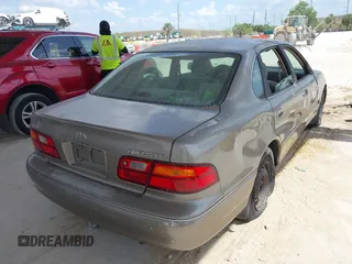 1998 Toyota Avalon XL with VIN 4T1BF18B7WU227251, listed as a IAAI auction lot 42213628 with 188,120 mi miles and . Bid and sale history available at DreamBid. Image 4.