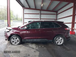 2019 Ford Edge SEL z VIN 2FMPK4J96KBB18838, wystawiony jako IAAI lot #42237001 z przebiegiem 72 875 mil mil oraz . Historia ofert i sprzedaży dostępna na DreamBid. Obrazek 14.